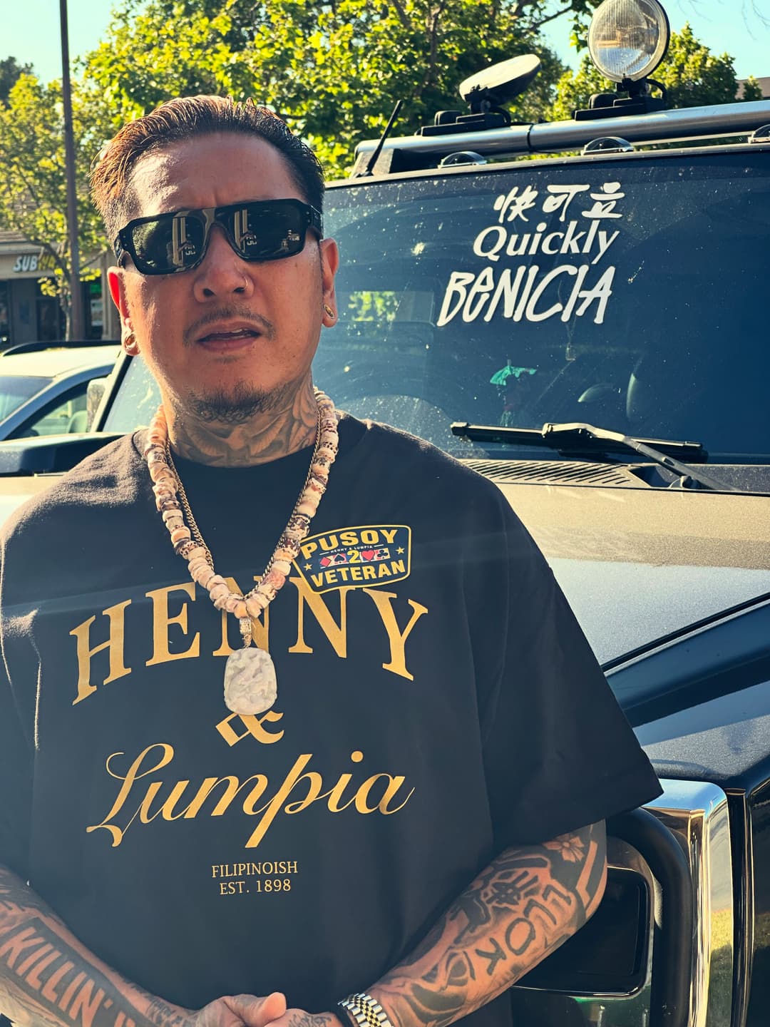 Lloyd Valentino, founder and artist of RIP Clothing, standing in the Bay Area